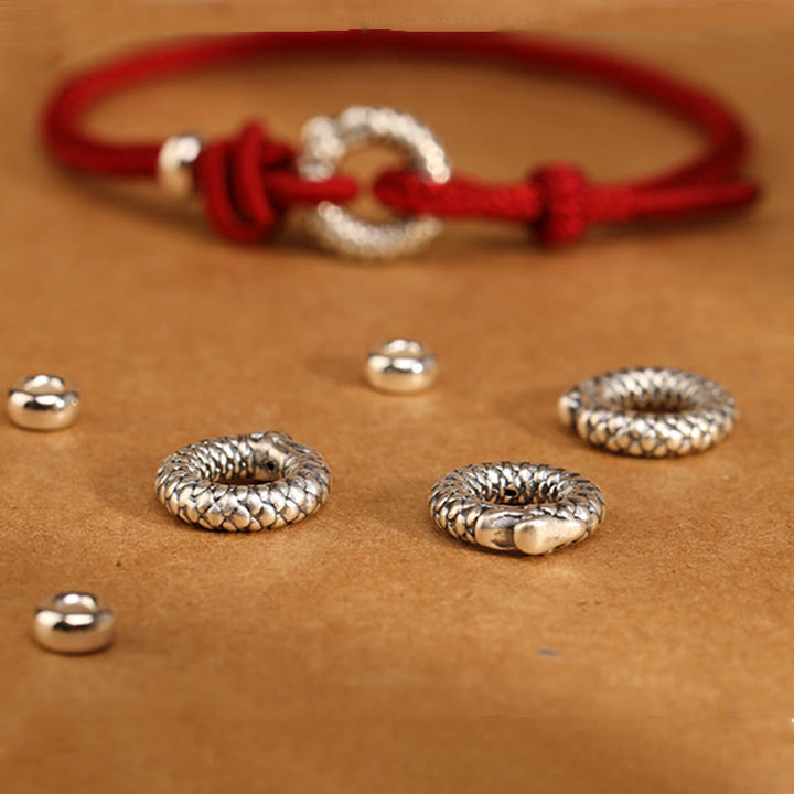 Braccialetto portafortuna con fibbia della pace dell'anno del drago in argento sterling 999 Buddha Stones