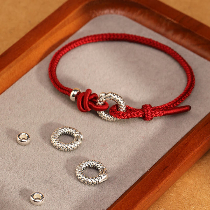 Braccialetto portafortuna con fibbia della pace dell'anno del drago in argento sterling 999 Buddha Stones