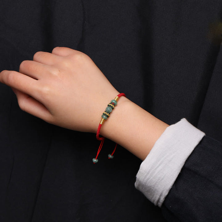 Braccialetto di corda rossa con perline di abaco in giada e Buddha Stones