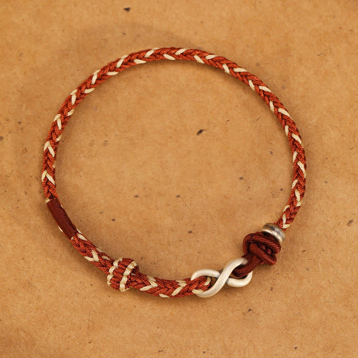 Braccialetto con corda portafortuna con simbolo dell'infinito e nodo infinito in argento sterling 999 fatto a mano Buddha Stones