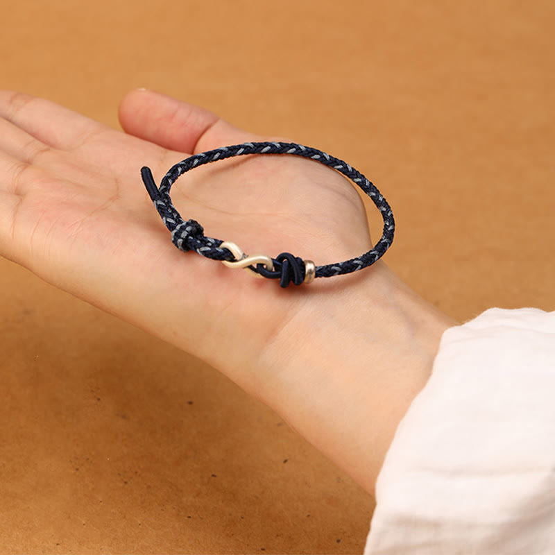 Braccialetto con corda portafortuna con simbolo dell'infinito e nodo infinito in argento sterling 999 fatto a mano Buddha Stones