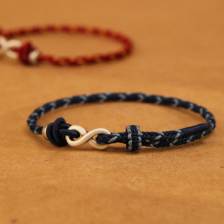 Braccialetto con corda portafortuna con simbolo dell'infinito e nodo infinito in argento sterling 999 fatto a mano Buddha Stones
