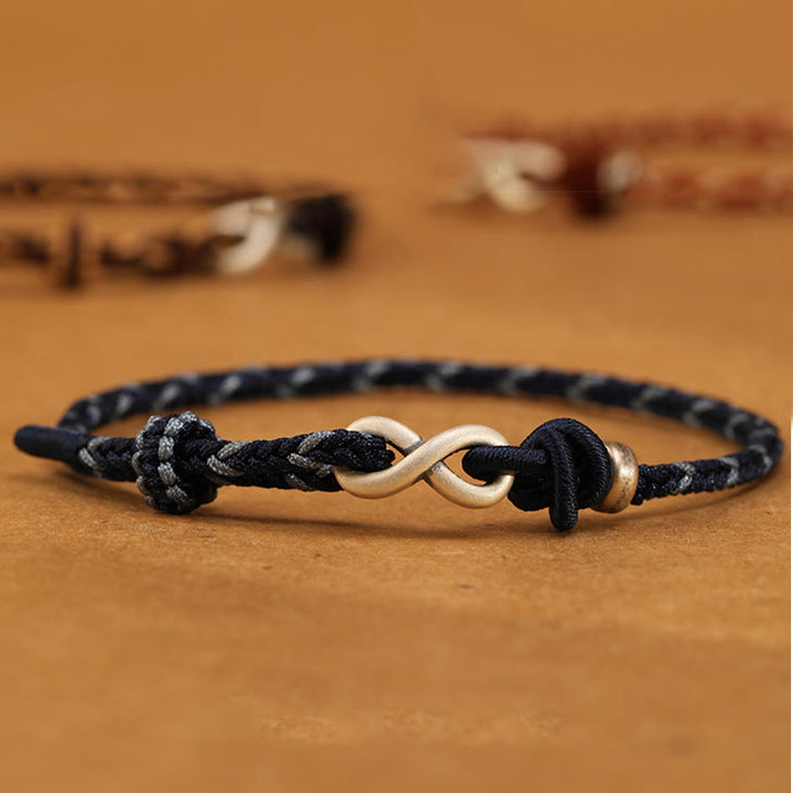 Braccialetto con corda portafortuna con simbolo dell'infinito e nodo infinito in argento sterling 999 fatto a mano Buddha Stones