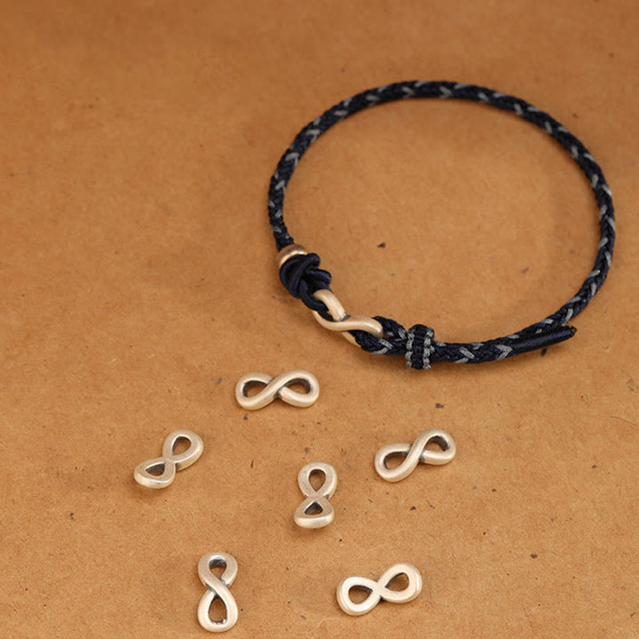 Braccialetto con corda portafortuna con simbolo dell'infinito e nodo infinito in argento sterling 999 fatto a mano Buddha Stones