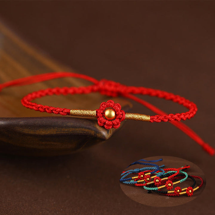 Braccialetto di corda di protezione della fortuna con design a fiori fatto a mano con perline in oro 999 Buddha Stones