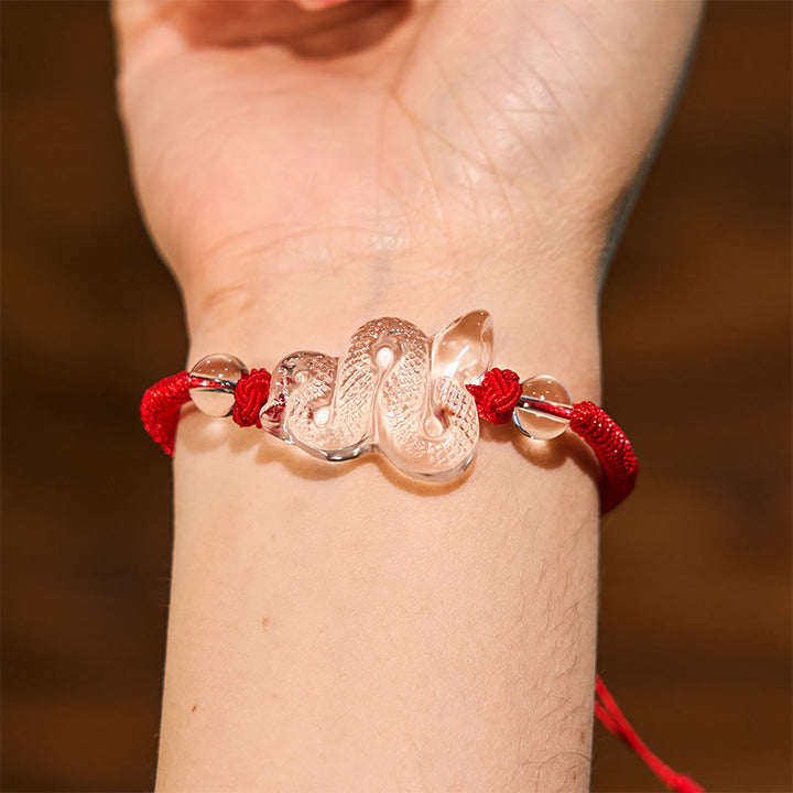 Braccialetto curativo dell'anno del serpente con corda di cristallo bianco Buddha Stones