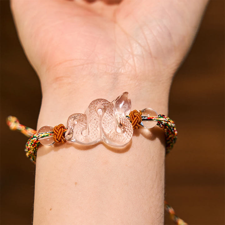 Braccialetto curativo dell'anno del serpente con corda di cristallo bianco Buddha Stones