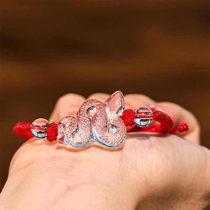 Braccialetto curativo dell'anno del serpente con corda di cristallo bianco Buddha Stones