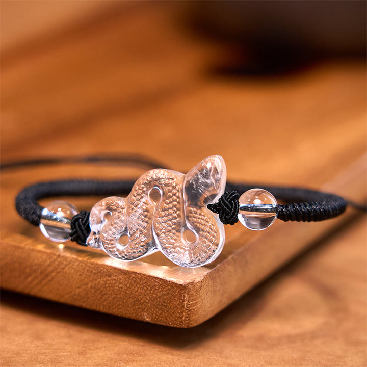 Braccialetto curativo dell'anno del serpente con corda di cristallo bianco Buddha Stones