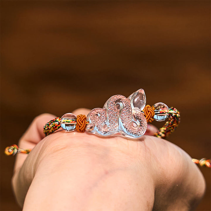 Braccialetto curativo dell'anno del serpente con corda di cristallo bianco Buddha Stones