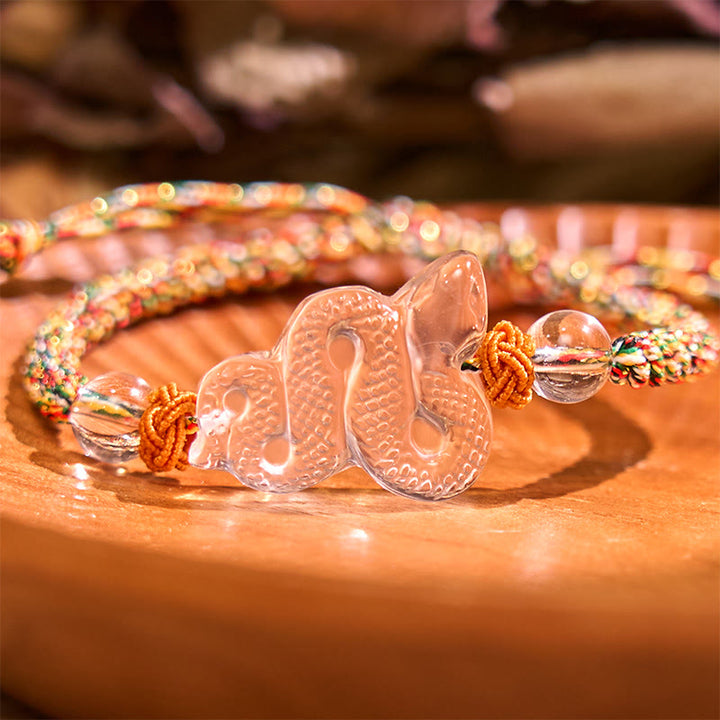 Braccialetto curativo dell'anno del serpente con corda di cristallo bianco Buddha Stones