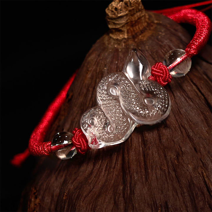 Braccialetto curativo dell'anno del serpente con corda di cristallo bianco Buddha Stones
