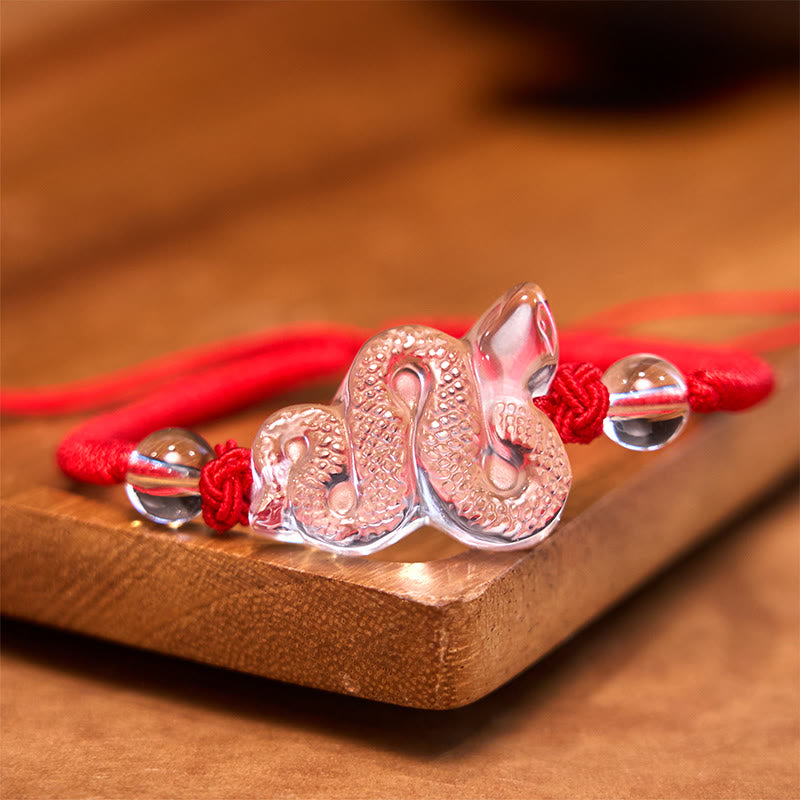 Braccialetto curativo dell'anno del serpente con corda di cristallo bianco Buddha Stones