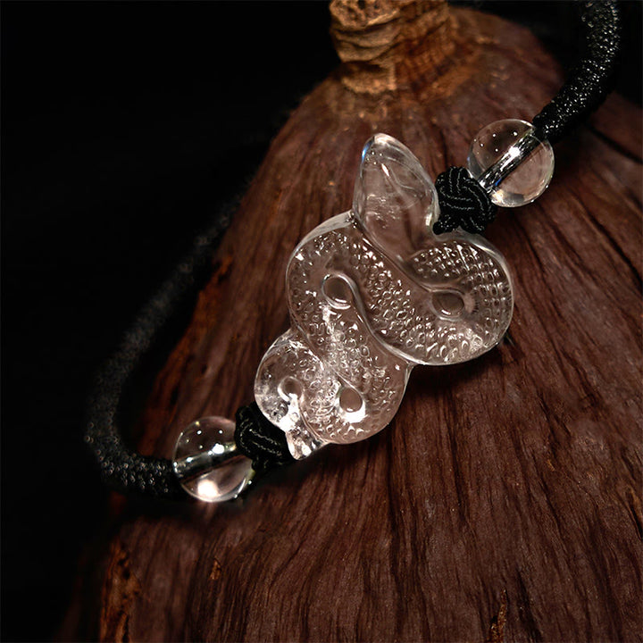 Braccialetto curativo dell'anno del serpente con corda di cristallo bianco Buddha Stones
