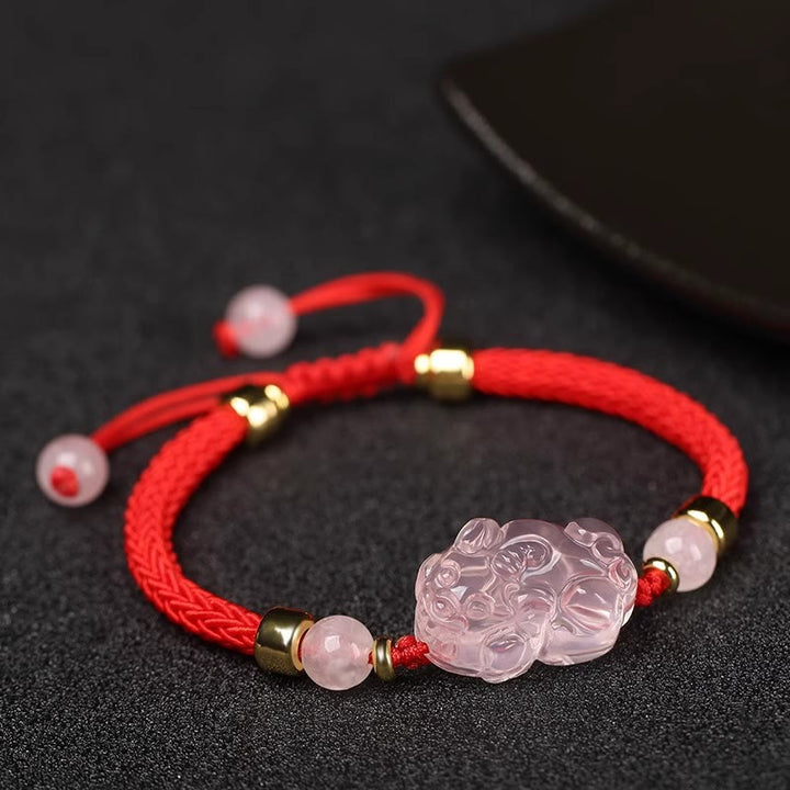 Braccialetto intrecciato con corda di cristallo rosa Buddha Stones PiXiu