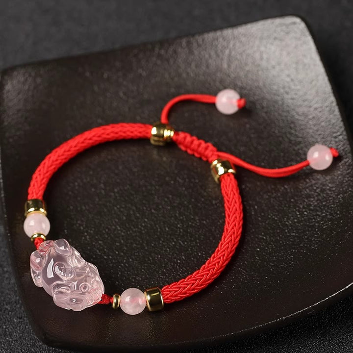 Braccialetto intrecciato con corda di cristallo rosa Buddha Stones PiXiu