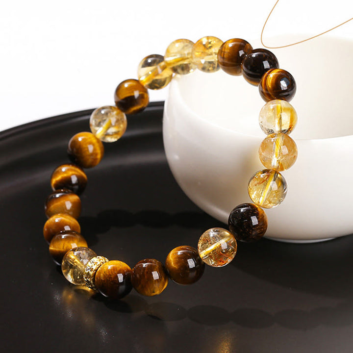 Braccialetto di forza con perle di citrino occhio di tigre naturale Buddha Stones