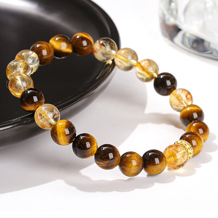 Braccialetto di forza con perle di citrino occhio di tigre naturale Buddha Stones