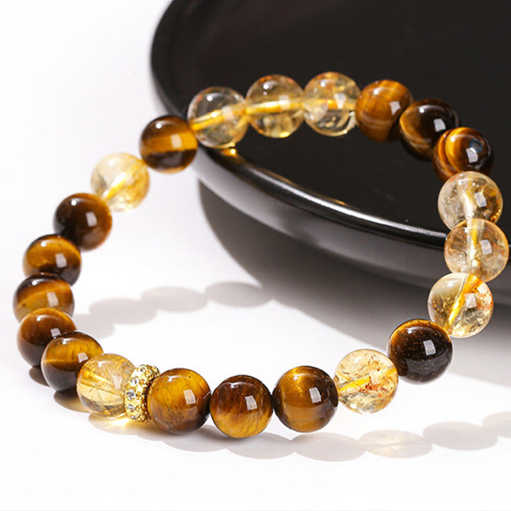 Braccialetto di forza con perle di citrino occhio di tigre naturale Buddha Stones