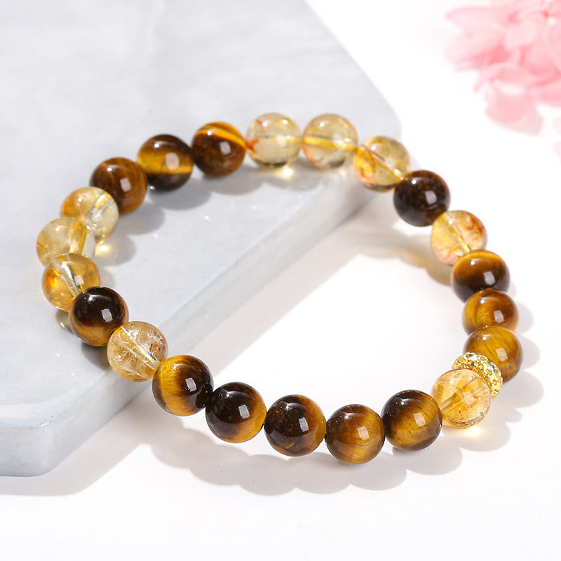 Braccialetto di forza con perle di citrino occhio di tigre naturale Buddha Stones