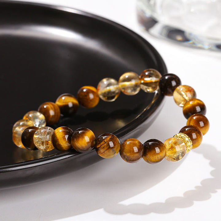 Braccialetto di forza con perle di citrino occhio di tigre naturale Buddha Stones