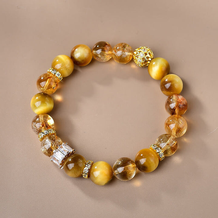 Braccialetto di forza e coraggio con perle di occhio di tigre naturale e citrino Buddha Stones