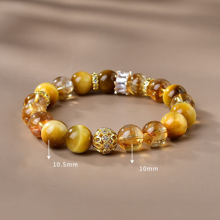 Braccialetto di forza e coraggio con perle di occhio di tigre naturale e citrino Buddha Stones