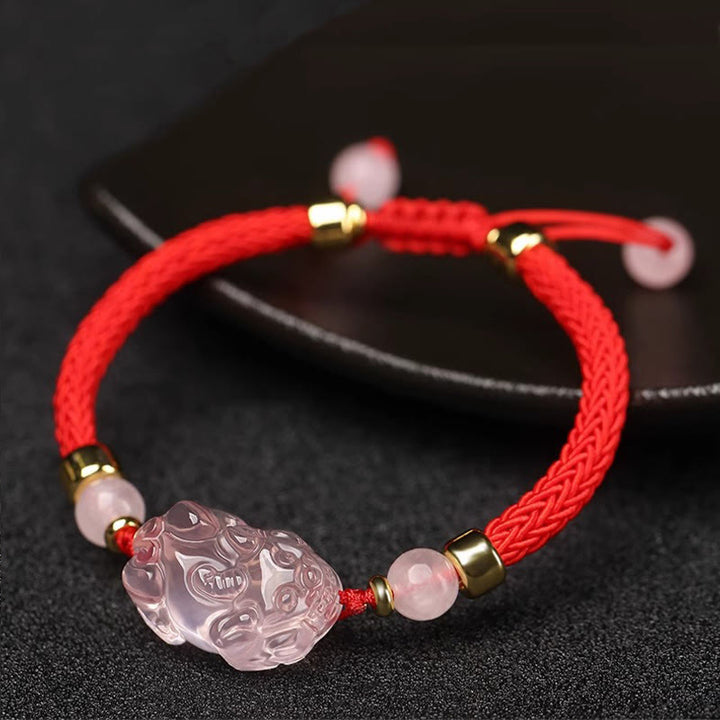 Braccialetto intrecciato con corda di cristallo rosa Buddha Stones PiXiu