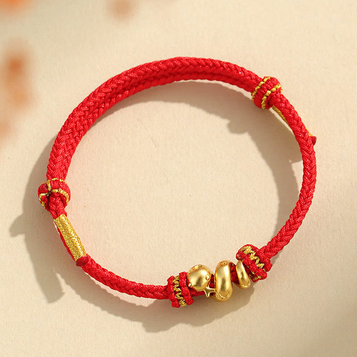 Braccialetto intrecciato con protezione in corda rossa con anno del serpente dorato in argento sterling 999 fatto a mano Buddha Stones