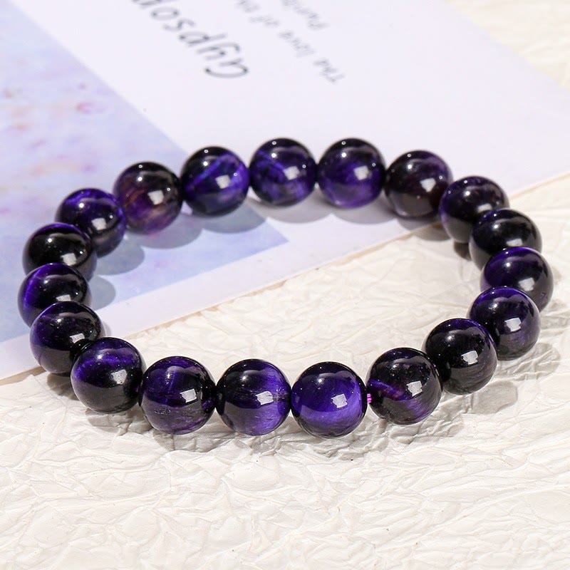 Braccialetto della creatività con occhio di tigre viola Buddha Stones