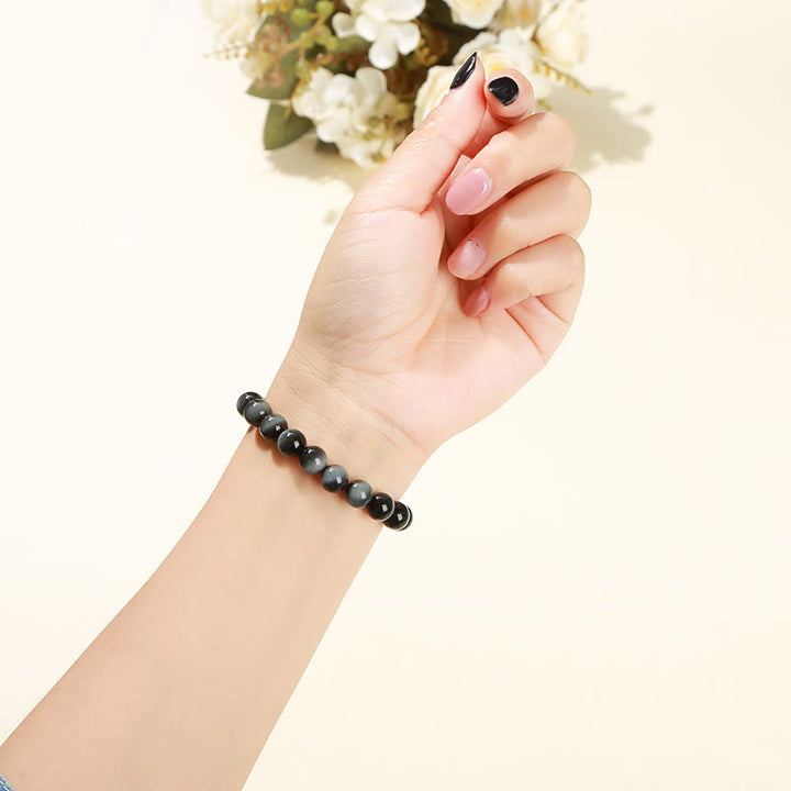 Braccialetto Buddha Stones Natural Eagle's Eye Stone Coraggio Positivo