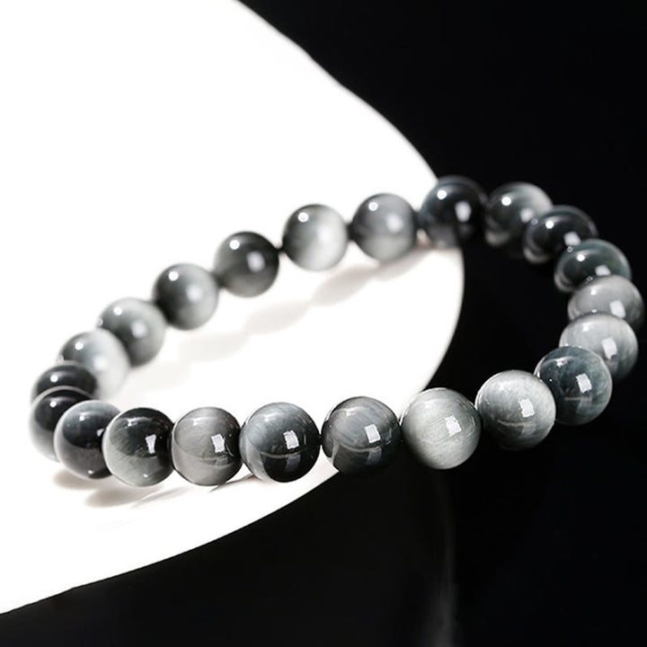 Braccialetto Buddha Stones Natural Eagle's Eye Stone Coraggio Positivo
