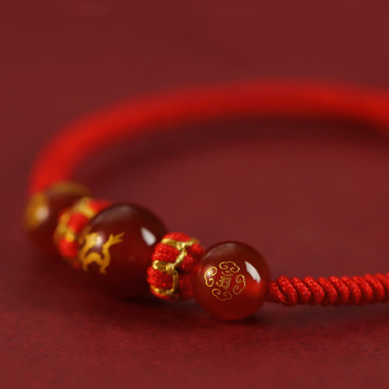 Braccialetto di protezione intrecciato con corda rossa in agata rossa fatto a mano con zodiaco cinese Buddha Stones