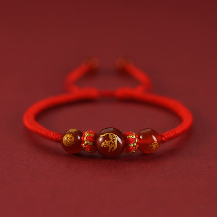 Braccialetto di protezione intrecciato con corda rossa in agata rossa fatto a mano con zodiaco cinese Buddha Stones