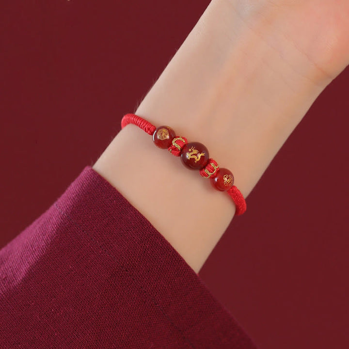 Braccialetto di protezione intrecciato con corda rossa in agata rossa fatto a mano con zodiaco cinese Buddha Stones