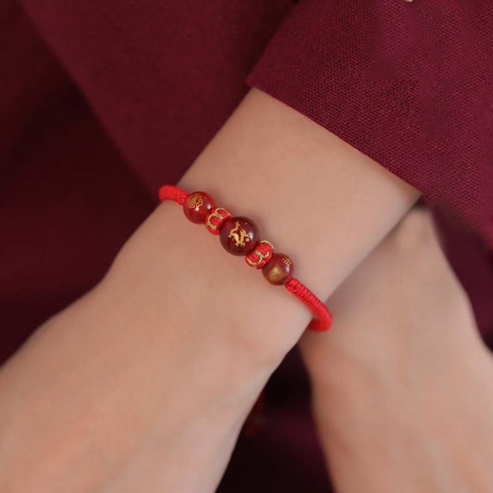 Braccialetto di protezione intrecciato con corda rossa in agata rossa fatto a mano con zodiaco cinese Buddha Stones