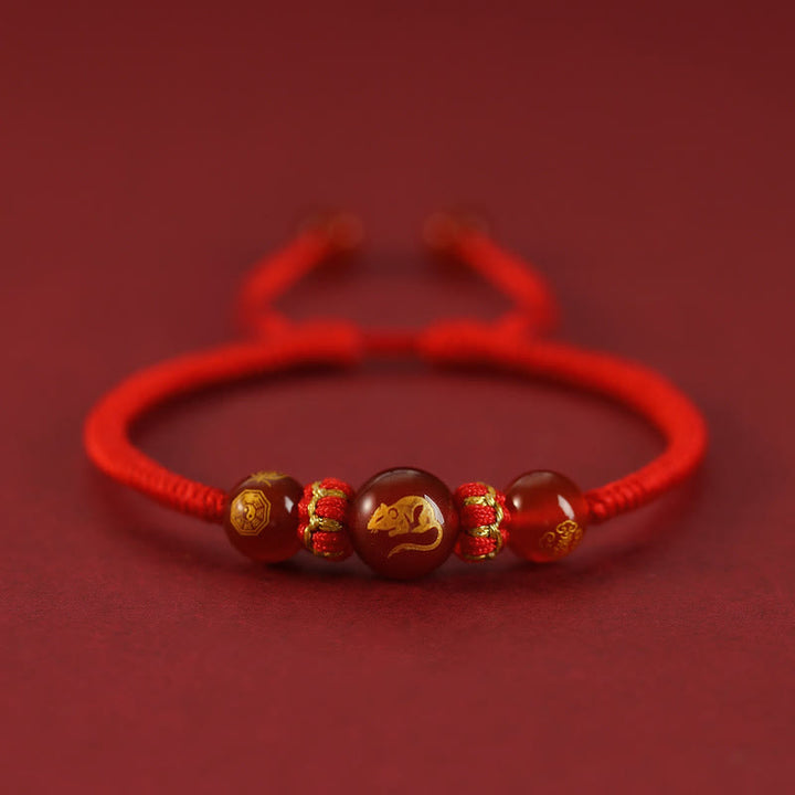Braccialetto di protezione intrecciato con corda rossa in agata rossa fatto a mano con zodiaco cinese Buddha Stones