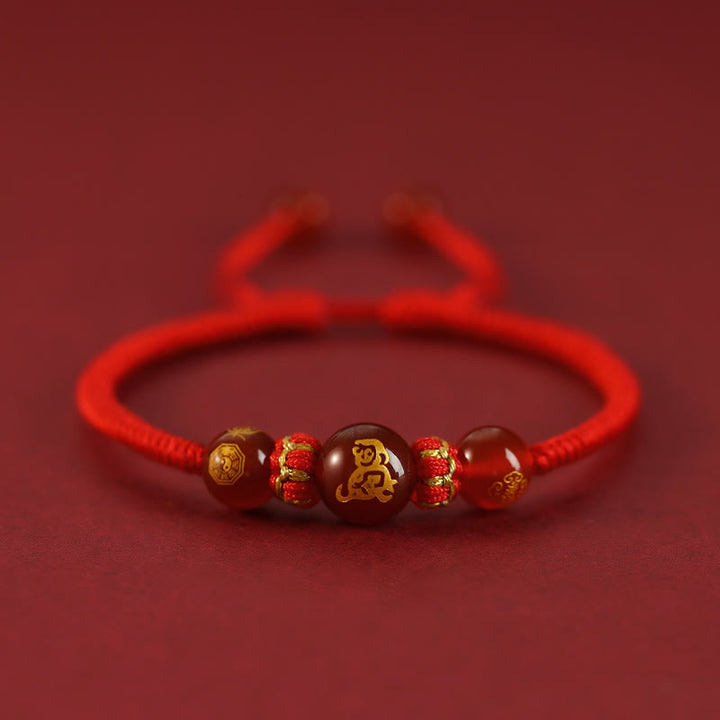 Braccialetto di protezione intrecciato con corda rossa in agata rossa fatto a mano con zodiaco cinese Buddha Stones