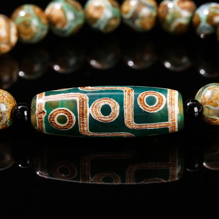 Buddha Stones Braccialetto di protezione del potere di agata bianca occhio di gatto di sandalo naturale di Dzi a nove occhi tibetano