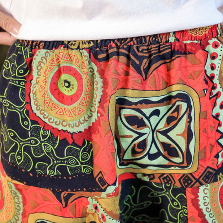 Pantaloni harem da uomo in cotone con stampa di foglie casual in oro rosso con tasche Buddha Stones