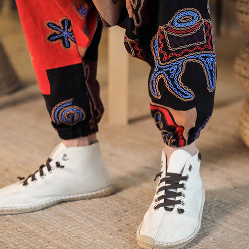 Pantaloni harem da uomo in cotone con stampa floreale a griglia con Buddha Stones e tasche