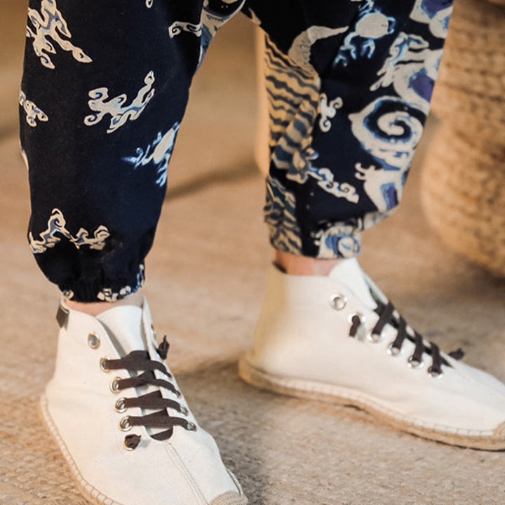 Pantaloni harem da uomo in cotone con motivo a drago cinese e tasche, modello Buddha Stones