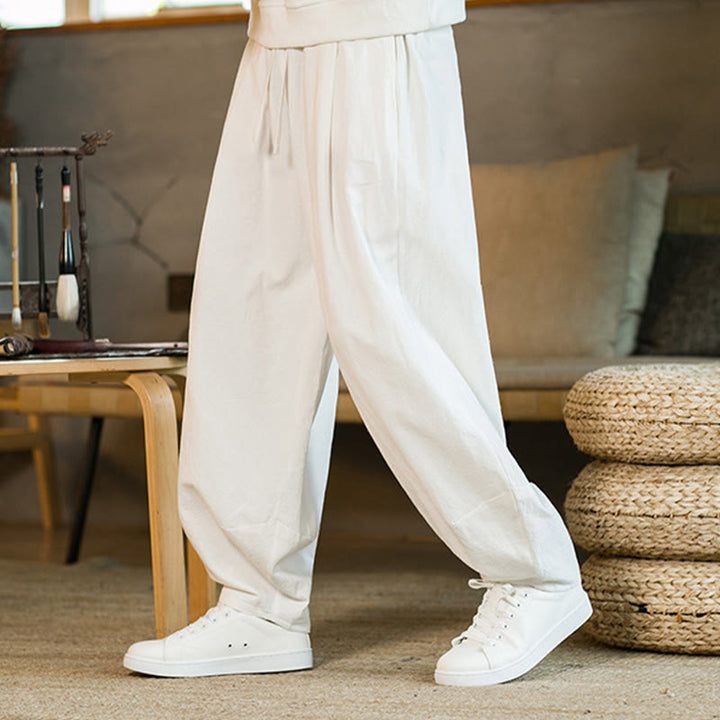 Pantaloni harem da uomo in cotone e lino tinta unita con coulisse e tasche, motivo Buddha Stones