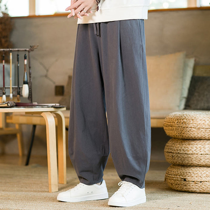 Pantaloni harem da uomo in cotone e lino tinta unita con coulisse e tasche, motivo Buddha Stones