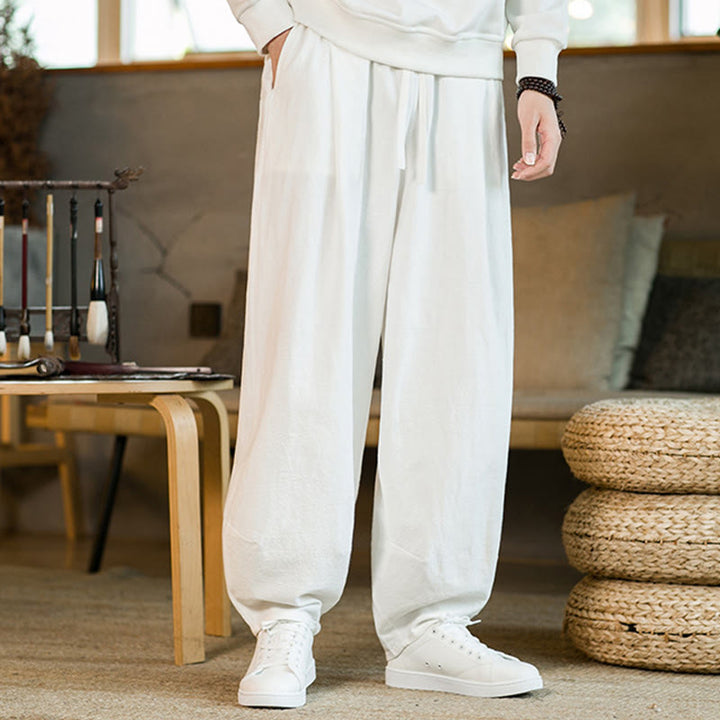 Pantaloni harem da uomo in cotone e lino tinta unita con coulisse e tasche, motivo Buddha Stones