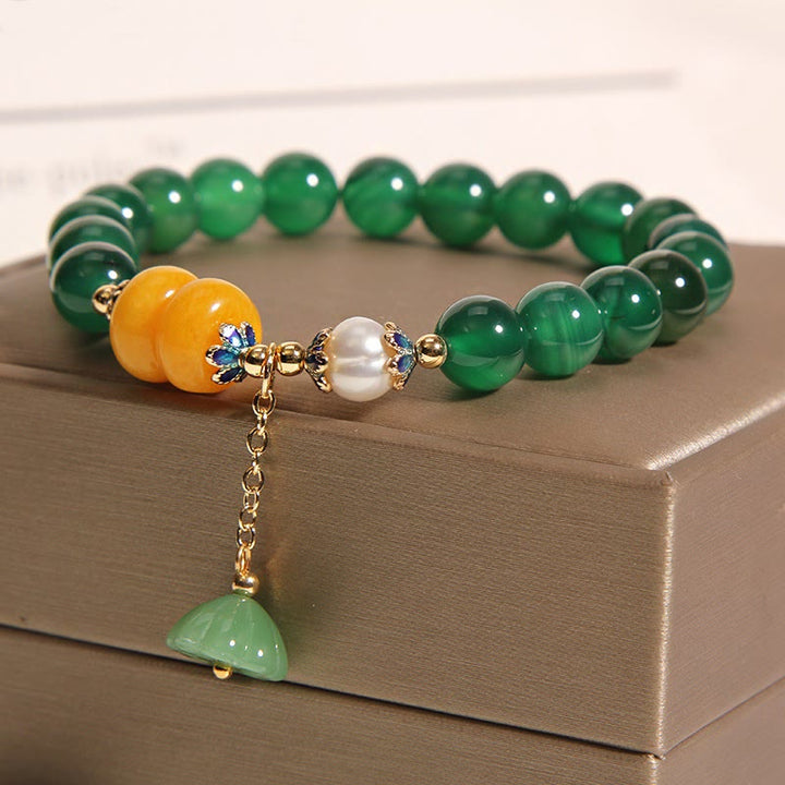 Braccialetto di supporto con baccello di loto in agata verde e perla Buddha Stones