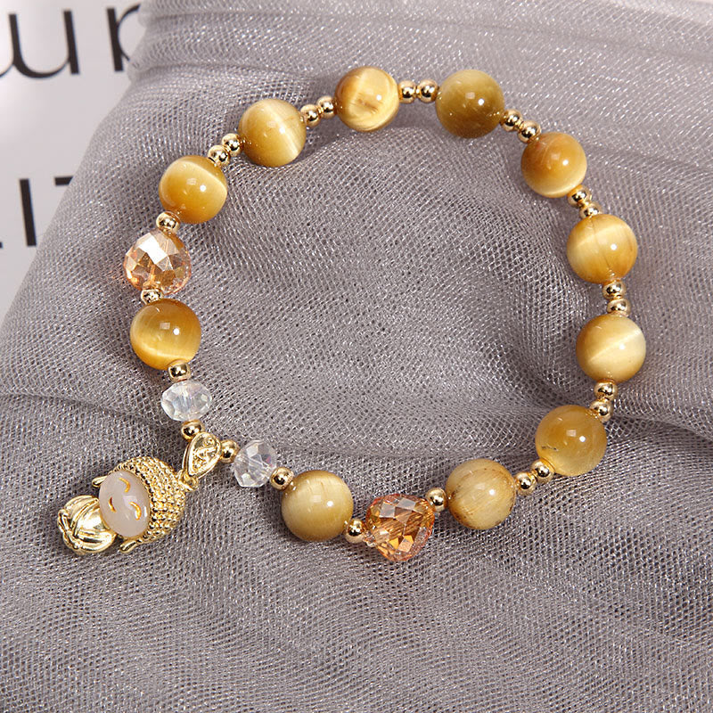 Braccialetto di protezione Buddha con occhio di tigre giallo e Buddha Stones
