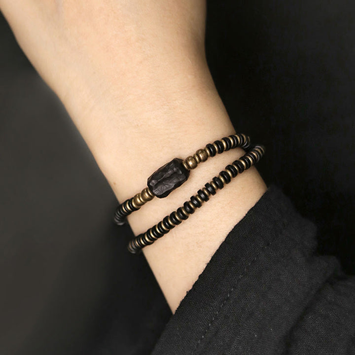 Braccialetto doppio giro calmante in ottone e rame con Buddha Stones, legno di ebano e sandalo verde