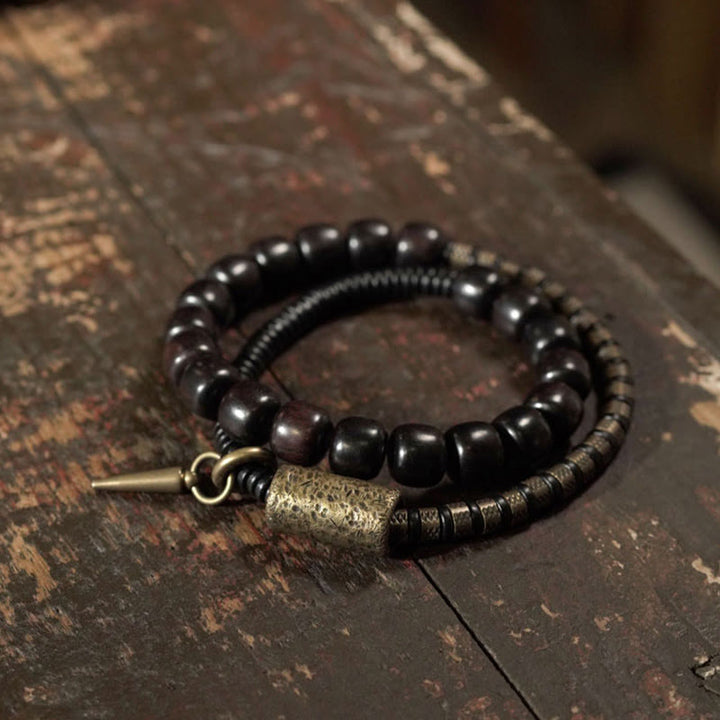 Braccialetto di equilibrio a doppio giro con perline vintage in legno di ebano, ottone e rame Buddha Stones