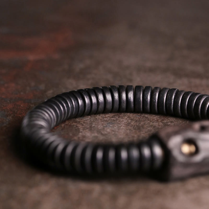 Bracciale Buddha Stones in legno di ebano, rame e ottone con fori per l'equilibrio - image 7